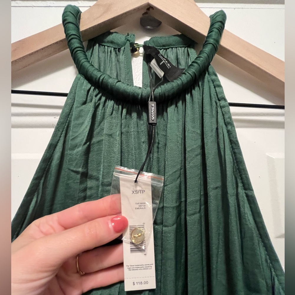 Mid length Tahari Green xsmall dress.